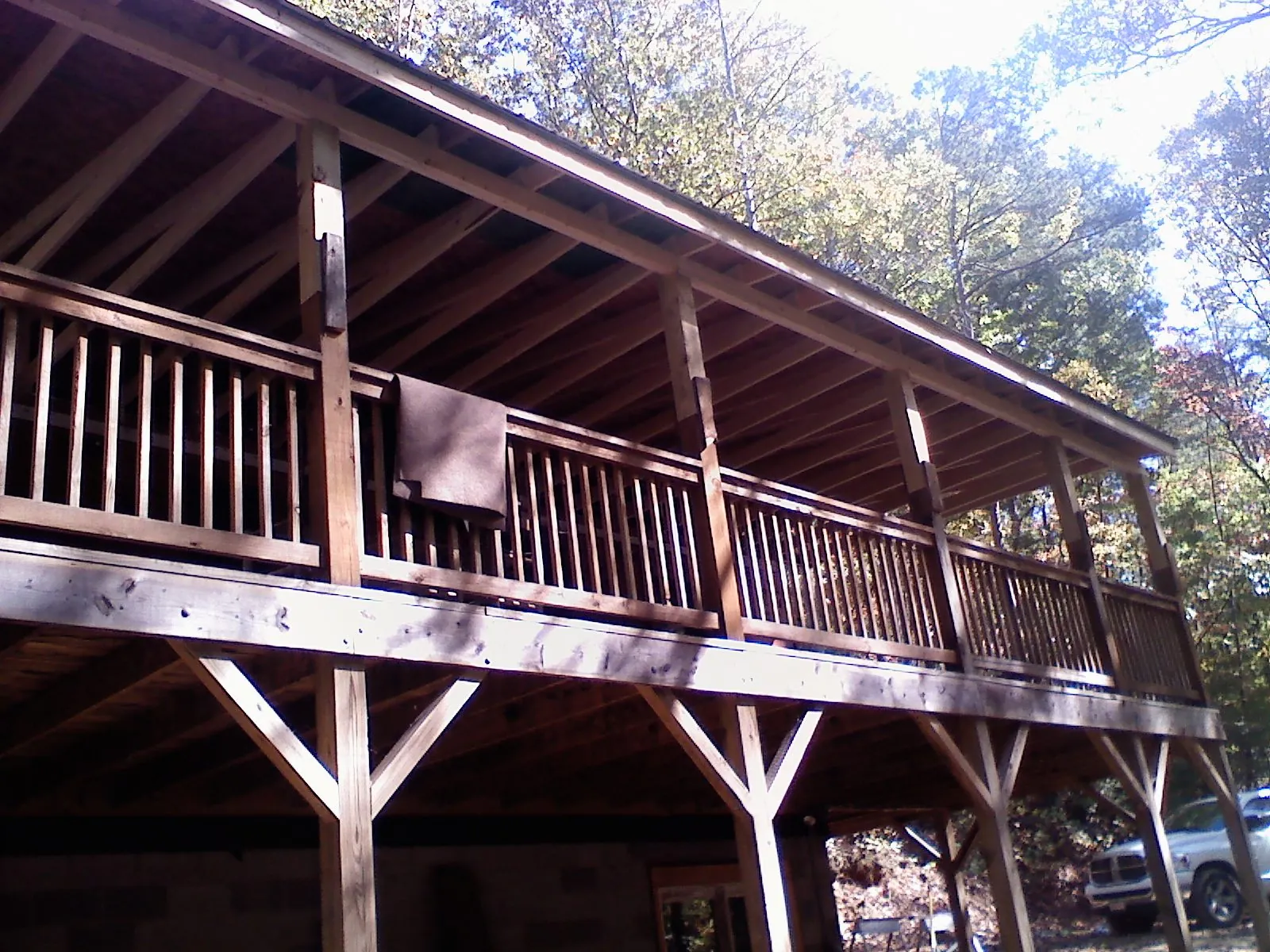Timber framing under a new elevated porch and deck — Roof Leak Repair in La Grange Park by Roofing Brothers